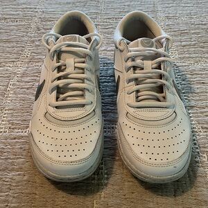 White Nike with Silver Swoosh. Size 8